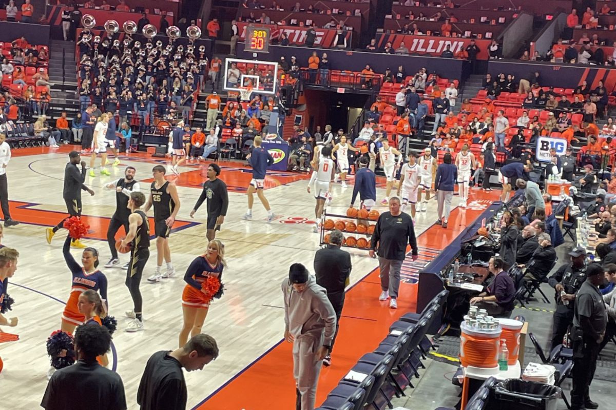 Illinois and Oakland warming up before Wednesday night's game.