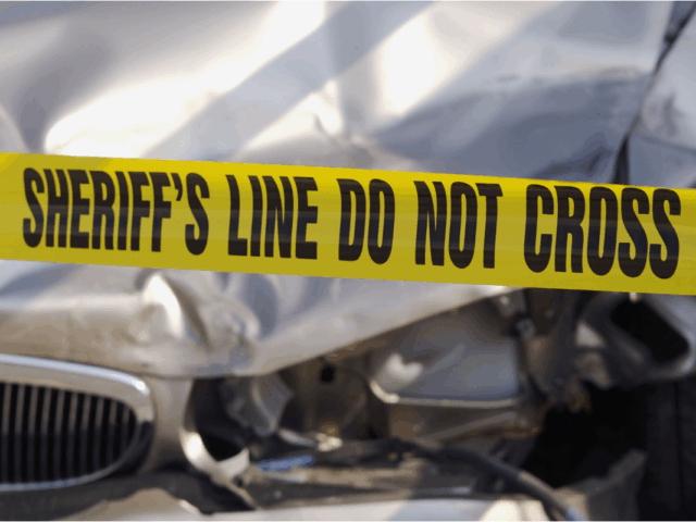 Car hit by a train Monday after trying to go around the arm.