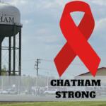 Water tower labeled 'Village of Chatham' beside a large red awareness ribbon and 'Chatham Strong' text, symbolizing local support/event.