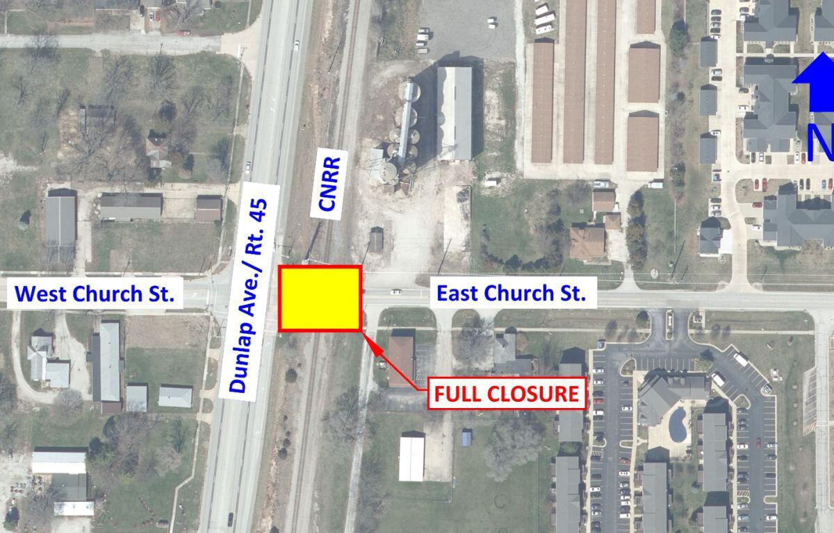Aerial map showing a full road closure at the intersection of East Church St and Dunlap Ave/RT 45, highlighted with a yellow block and red outline on the southeast corner.