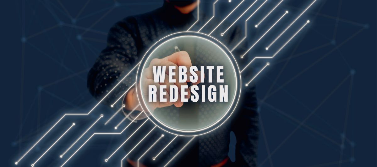Graphic of a person in dark clothing reaching toward a glowing circle that reads 'Website Redesign' with neon circuit lines in the background, symbolizing tech changes.