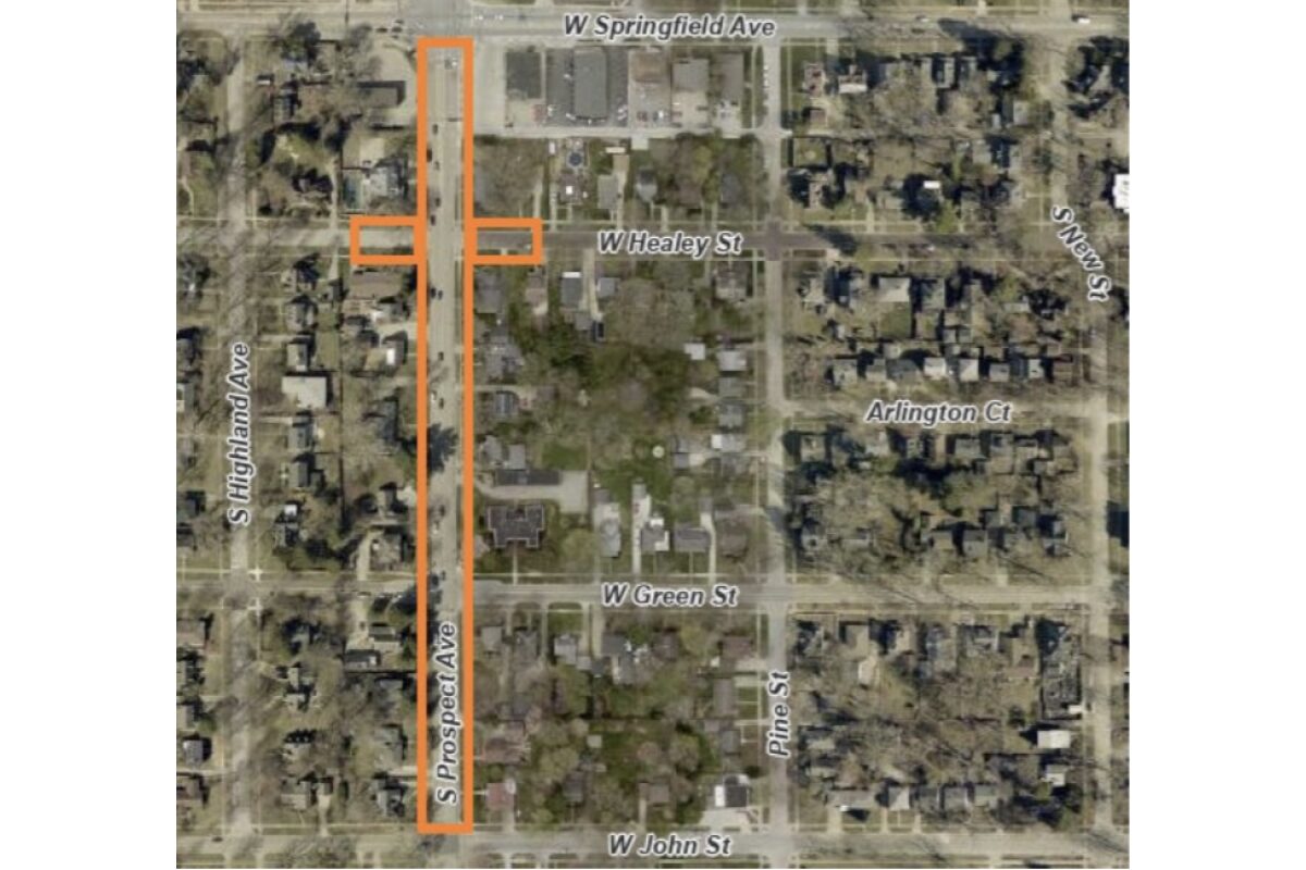 Aerial map with an orange outline highlighting a long vertical strip along S Prospect Ave from W John St upward near W Springfield Ave in a residential area.